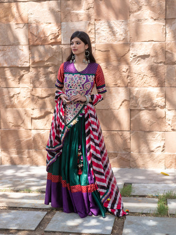 Half n half green Purple Navratri Chaniya choli by Kalpanas Creations