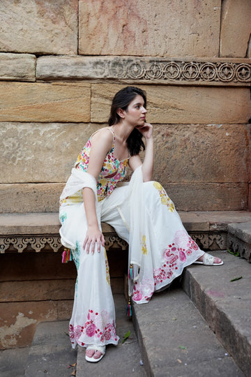 Dive into a world of ethereal charm and contemporary elegance with the White Indowestern Outfit from the Charme Chic Collection by Kalpana's Creations