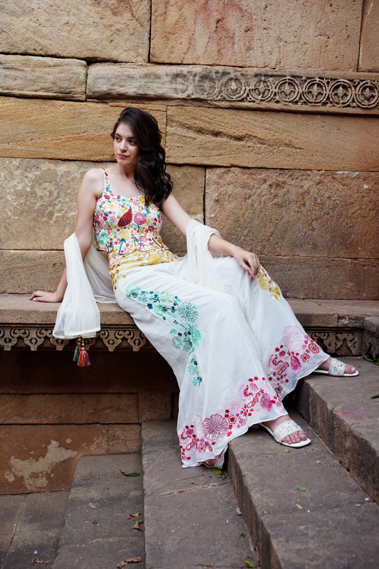 Dive into a world of ethereal charm and contemporary elegance with the White Indowestern Outfit from the Charme Chic Collection by Kalpana's Creations