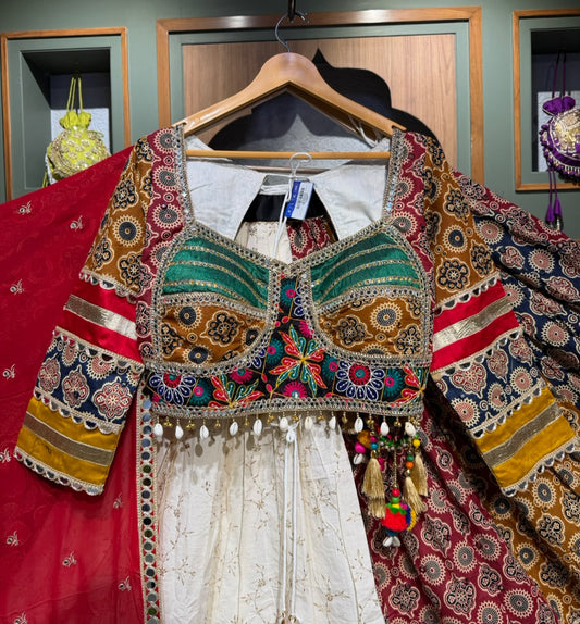 Designer White Ajrakh Chaniya Choli with Kutchi Mirror Work, Kodi Work & Red Dupatta