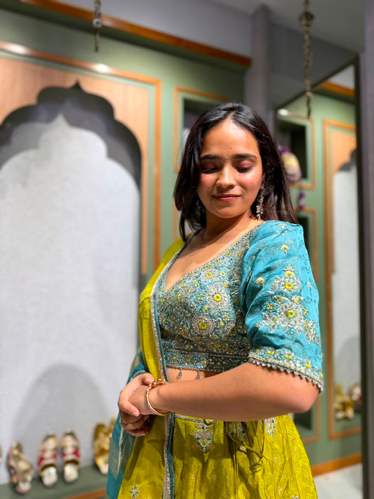 Lime Yellow Banarasi Chaniya Choli with Blue Tikki, Cutdana & Mirror Work