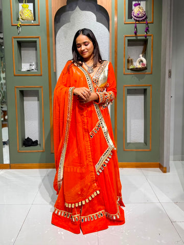 Orange Georgette Tikki Chaniya Choli with Mirror & Lappo Border Navratri Chaniya Choli