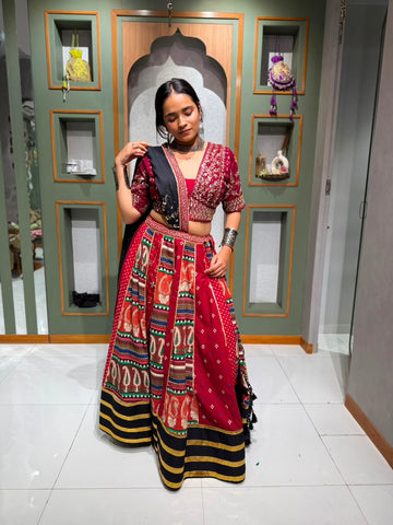 Designer Maroon Cotton Ajrakh & Bandhani Chaniya Choli with Lampi Border, Mirror Work Blouse & Black Mirror Work Dupatta