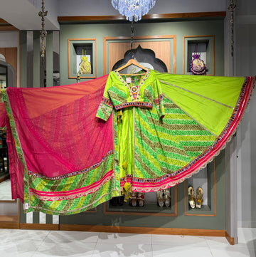 Green Colour Bombay Silk and Rayon Silk Multikali Chaniya with Kutchi and Mirror Border and Green Colour Bombay Silk  Blouse with mirror and kutchi work with pink colour Georgette dupatta with border.