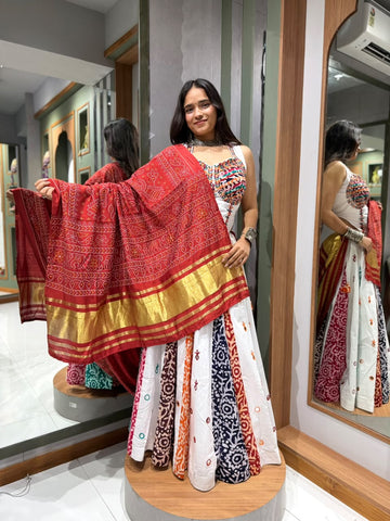 Designer White Cotton Multicolour Chaniya , Multicolour Blouse With mirror work Touch up and red bandhani dupatta
