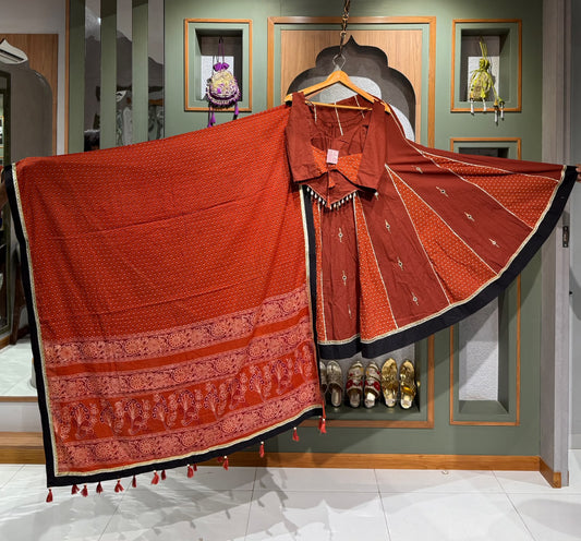 Designer Rust Orange Ajrakh Chaniya Set with Real Mirror & kodi Shell Work